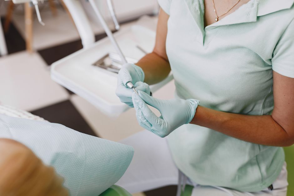 How can a dental hygienist help me stop my teeth from getting stained by coffee and tea over time?