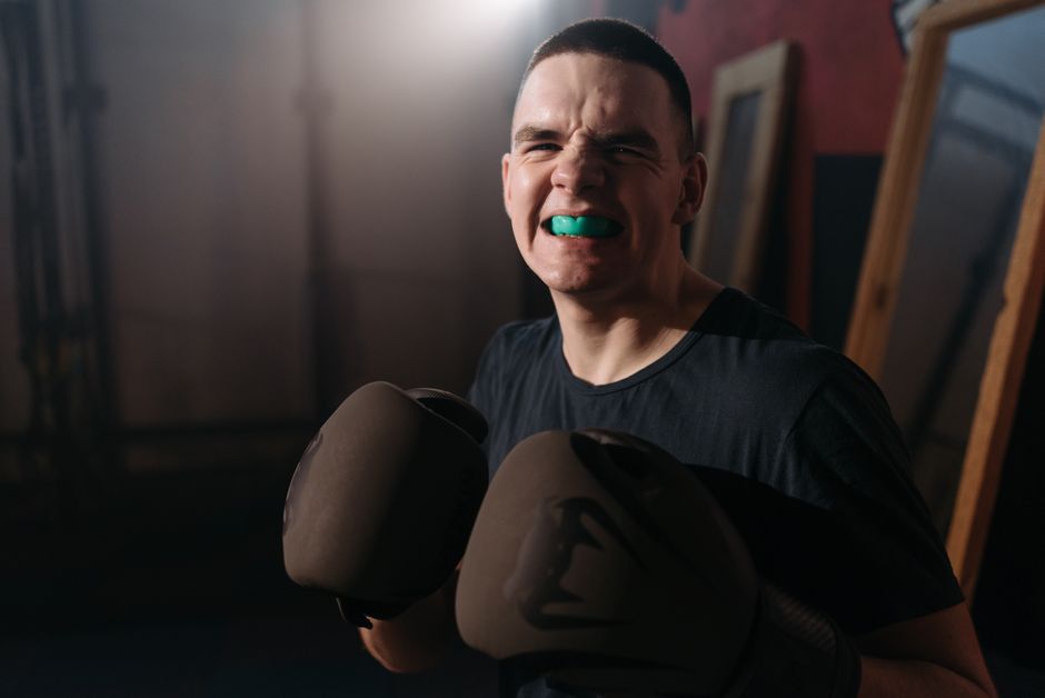 How do I know if I need a nightguard for my sports activities versus a general sports mouthguard?