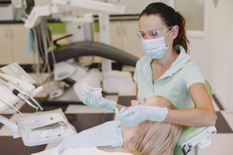 What are the typical costs and insurance coverage for scaling and root‑planing at a North Vancouver hygiene clinic?